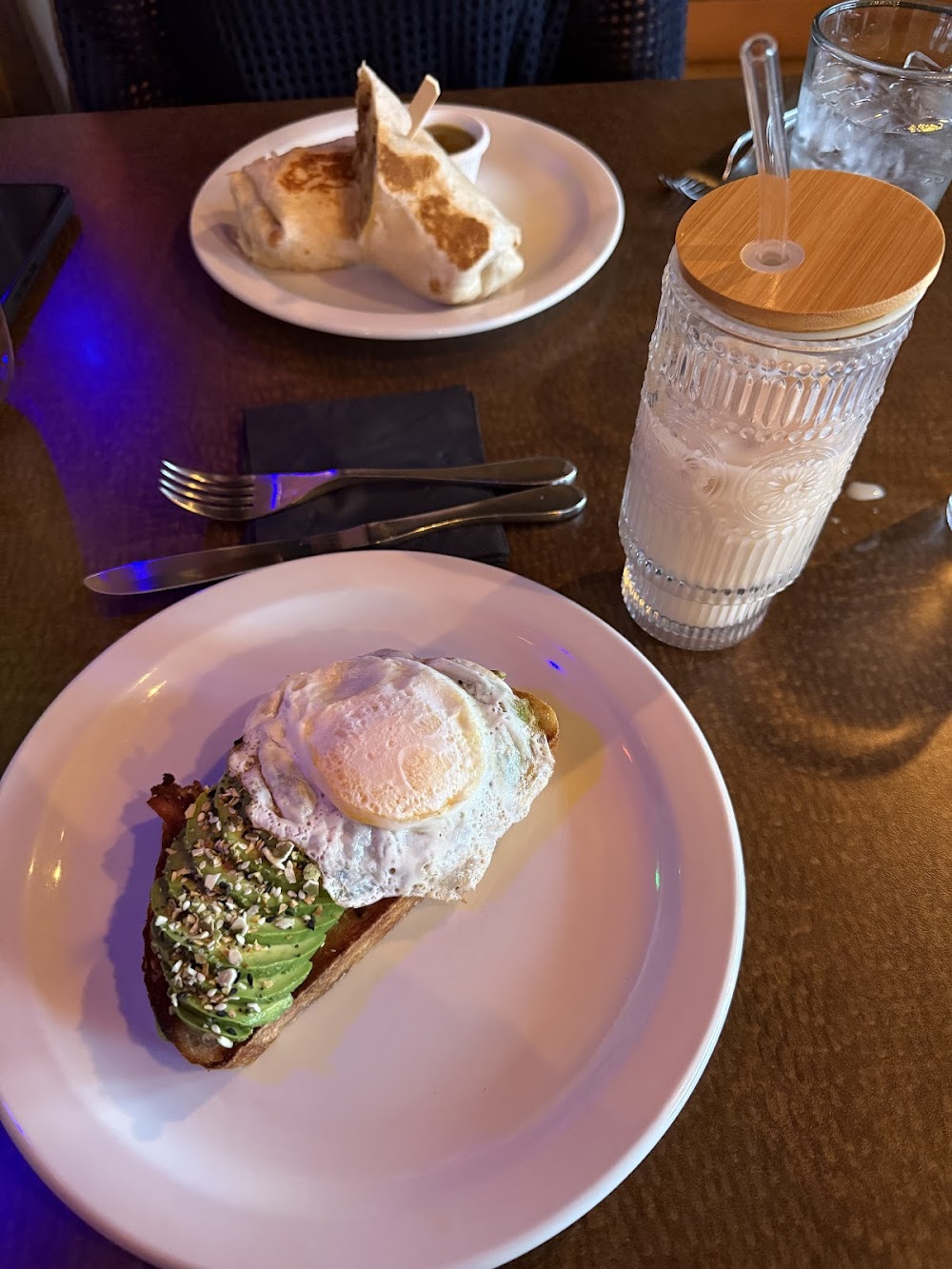 The District Coffee House signature dishes Avocado Toast, Breakfast Burrito, Specialty Lattes, Acai Bowls